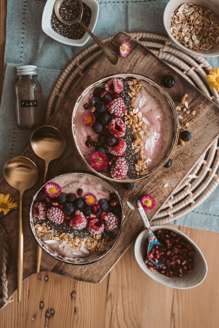 Quinoa Acai Berry Smoothie Bowl with Pine Nuts and Raspberries